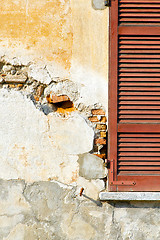 Image showing red window  varano   abstract  sunny day   in the concrete  bric
