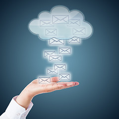 Image showing Open Palm Receiving Email Icons From The Cloud