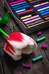 Image showing Tulip red white color and box with crayons