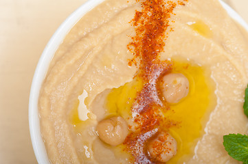 Image showing Hummus with mint on top