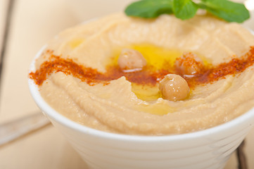 Image showing Hummus with mint on top