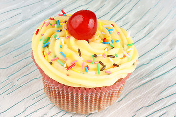 Image showing Fancy cupcake with lemon buttercream