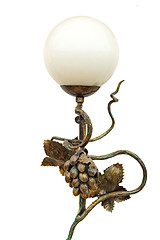 Image showing Beautiful lamp with metal wrought iron stand.