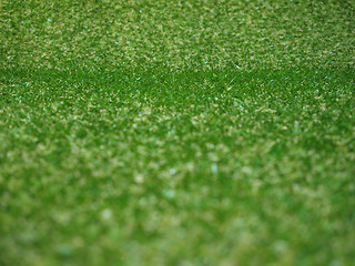 Image showing Green artificial synthetic grass meadow background