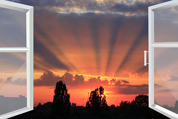 Image showing window opened to the picturesque scarlet sunset