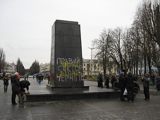 Image showing thrown bronze monument to Lenin in winter 22, 2014