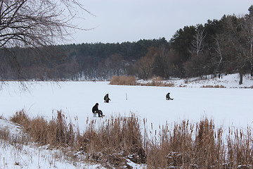 Image showing fishermen in the winter fishing