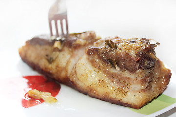 Image showing baked piece of meat on the plate