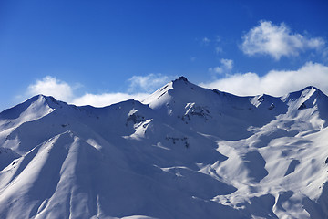 Image showing Snowy sunlight mountains