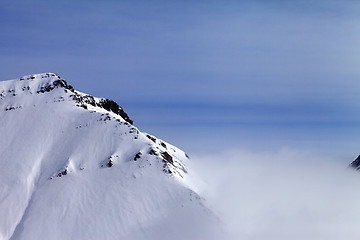 Image showing Snowy rocks in fog