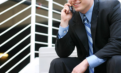 Image showing Businessman talking on cell