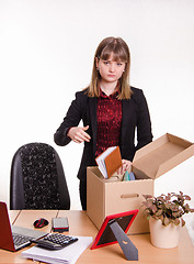 Image showing Dismissed girl in office throws their stuff a box