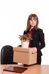 Image showing Dismissed girl in office with things hands of