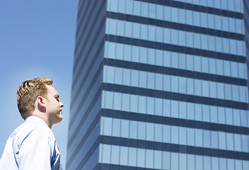 Image showing Businessman standing alone