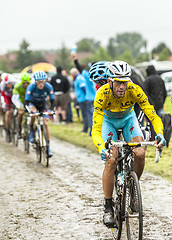 Image showing Vincenzo Nibali - Yellow Jersey on a Cobbled Road