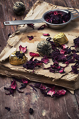 Image showing old book is strewn with the tea leaves