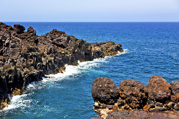 Image showing brown rock in white coast lanzarote   spain   beach  stone water