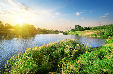 Image showing Bright sunset over river