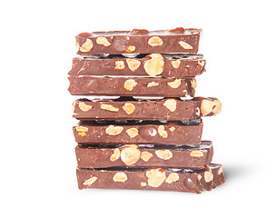 Image showing In front stack of seven chocolate bars