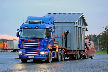 Image showing Scania R500 Hauls an Exceptional Load at Dusktime