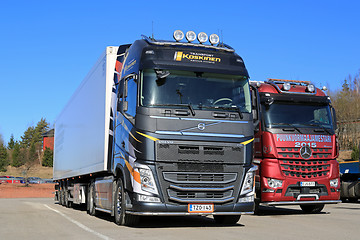 Image showing New Volvo FH 500 Semi and Mercedes-Benz Arocs Logging Trucks