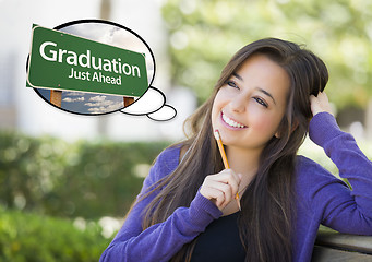 Image showing Young Woman with Thought Bubble of Graduation Green Road Sign 