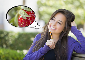 Image showing Pensive Woman with Strawberry Inside Thought Bubble