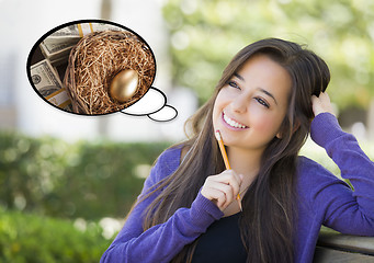 Image showing Pensive Woman with Money and Nest Egg Thought Bubble