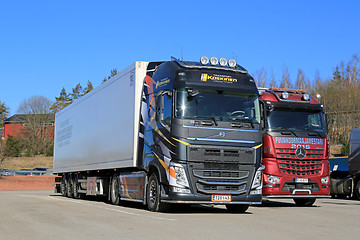 Image showing New Volvo FH 500 Semi and Mercedes-Benz Arocs Logging Trucks