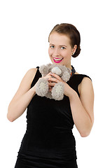 Image showing attractive smiling brunette holding teddy bear