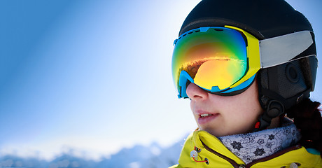 Image showing Woman wearing a helmet and glasses