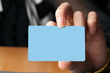 Image showing Hand Holding a Card