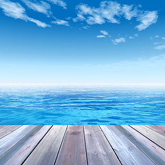 Image showing Conceptual wood deck over sea and sky