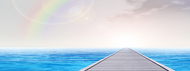 Image showing Conceptual wood deck pier on sea water banner