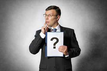 Image showing Businessman with question mark