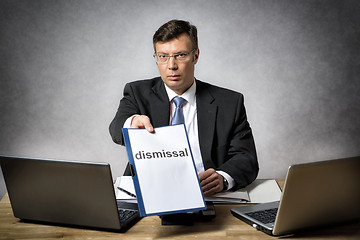 Image showing Boss dismiss somebody