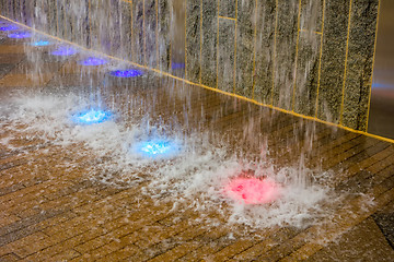 Image showing manmade waterfall with colorful led lights