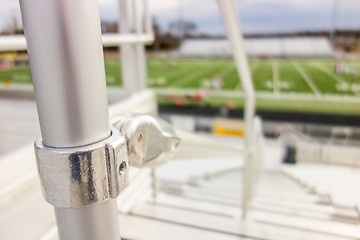 Image showing handrail connector at a sports stadium steps