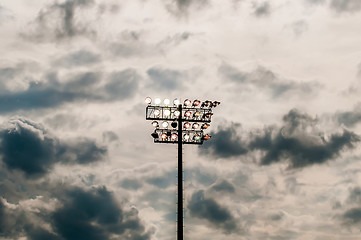 Image showing Stadium lights turn on at twilight time