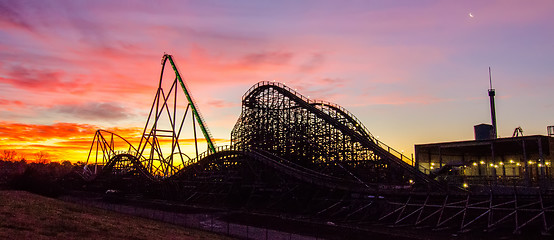 Image showing curves of a roller Coaster at Sunset or sunrise