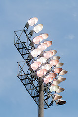 Image showing Stadium lights turn on at twilight time
