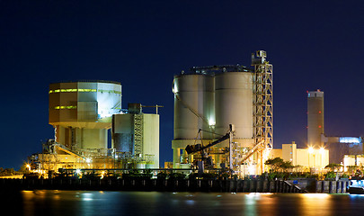 Image showing power station at night with smoke