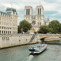 Image showing Notre Dame  with boat on Seine, France