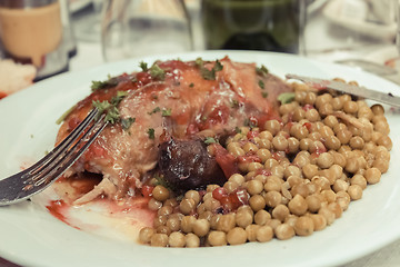 Image showing roasted duck leg with steamed vegetables