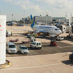 Image showing France, Paris - June 17, 2011:  Boeing connected to passenger boarding bridge at Charles de Gaulle Airport. Air France is the French flag carrier headquartered in Tremblay-en-France.