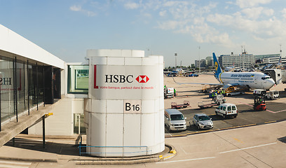 Image showing France, Paris - June 17, 2011: Boeing connected to passenger boarding bridge at Charles de Gaulle Airport. Air France is the French flag carrier headquartered in Tremblay-en-France.