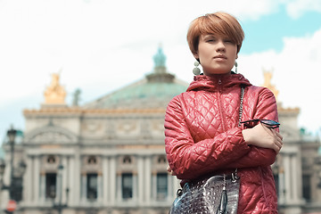 Image showing blonde woman portrait in front of Opera theater Paris, France.