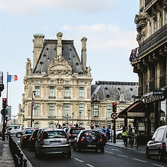 Image showing France, Paris - June 17, 2011: People walking in front of famous Louvre museum 