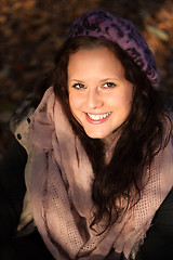 Image showing girl in beret looks upwards