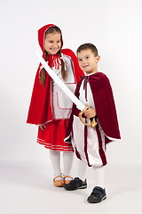 Image showing Two children in costumes, Prince, Little Red Riding Hood